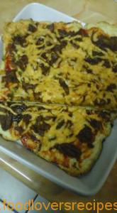 vinnig pizza Tharina